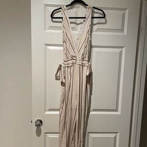 Jumpsuit with pockets. Size small